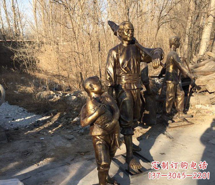 沈阳抱着鱼的儿童街边小品铜雕