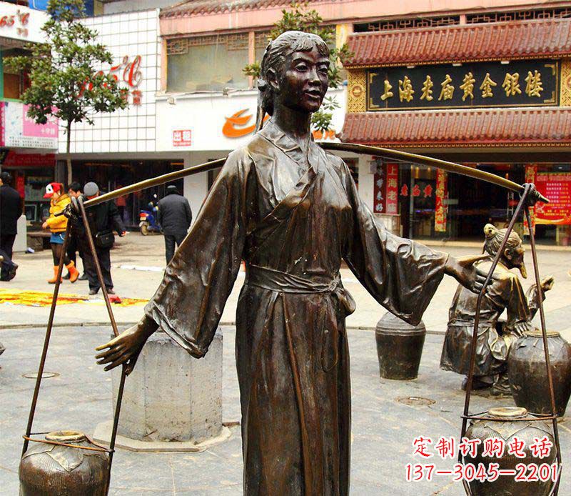 沈阳挑着罐子的古代女人铜雕