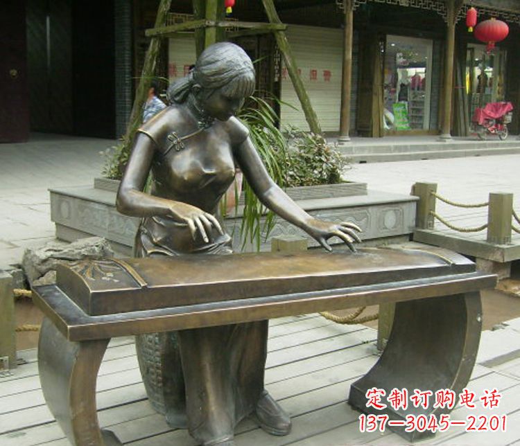 沈阳铜雕现代人物弹古筝雕塑