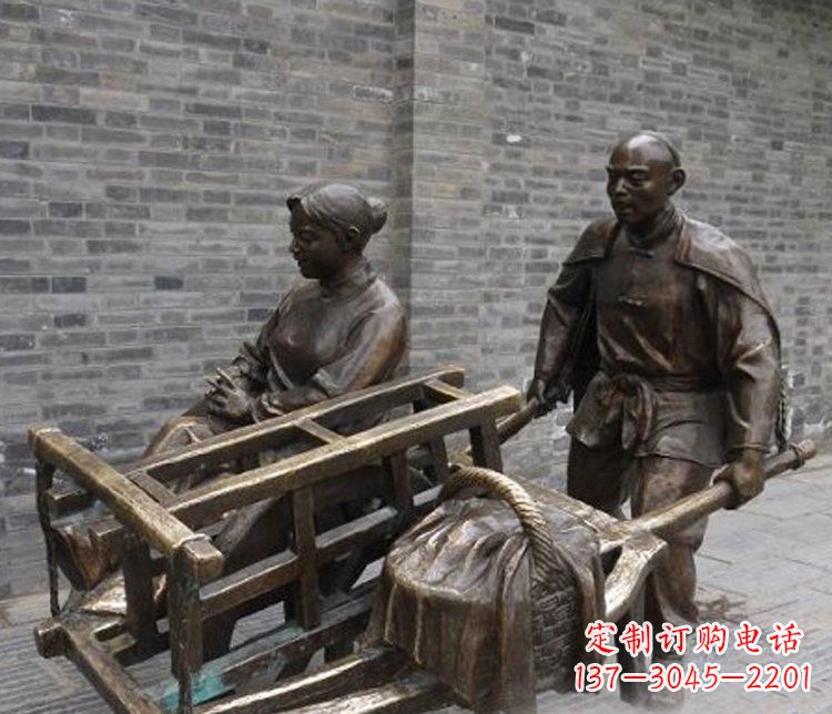 沈阳推独轮车的人物铜雕