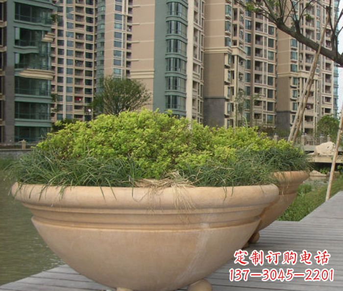 沈阳小区景观晚霞红花盆石雕